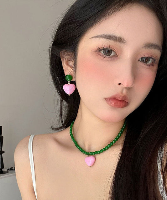 Pendientes de botón con cristales de amor rosados ​​y aleación de perla verde estilo