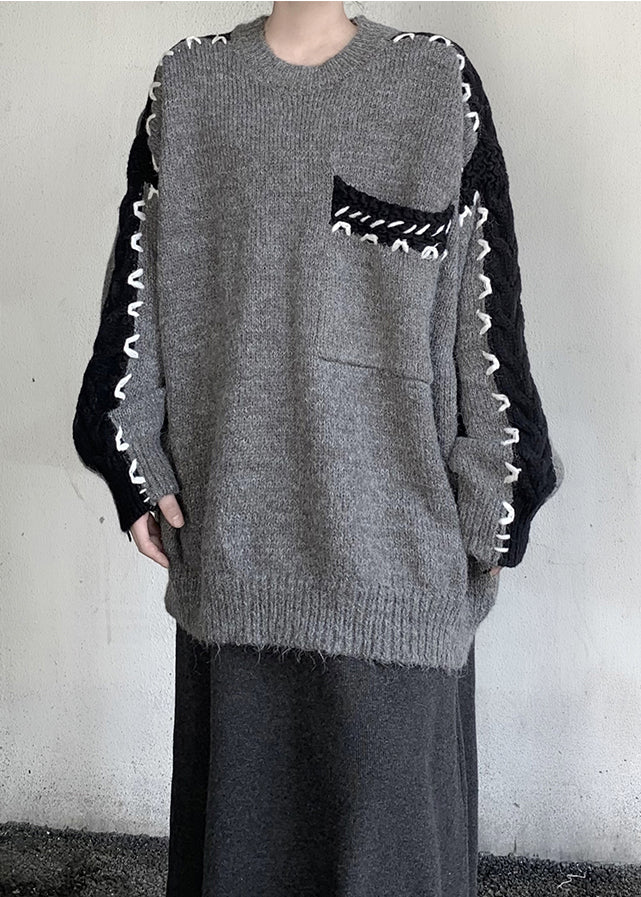 Stilvoller grauer Oversize-Strickpullover mit Patchwork-Muster für den Winter