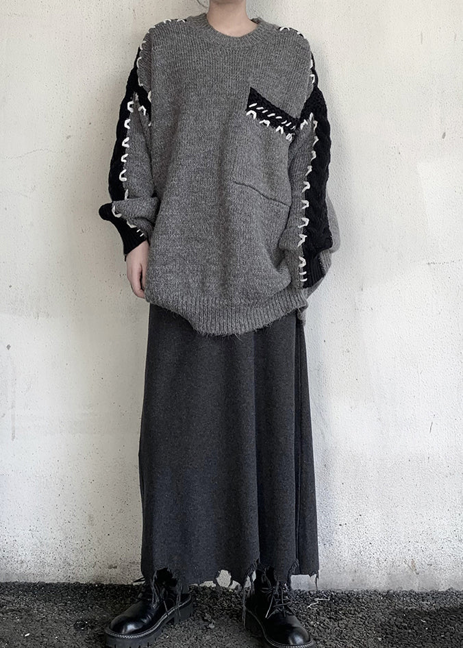 Stilvoller grauer Oversize-Strickpullover mit Patchwork-Muster für den Winter