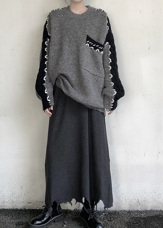 Stilvoller grauer Oversize-Strickpullover mit Patchwork-Muster für den Winter