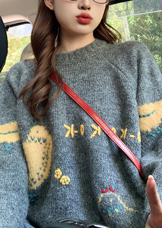 Oranger Strickpullover mit Rundhalsausschnitt, Frühlingsmotiv