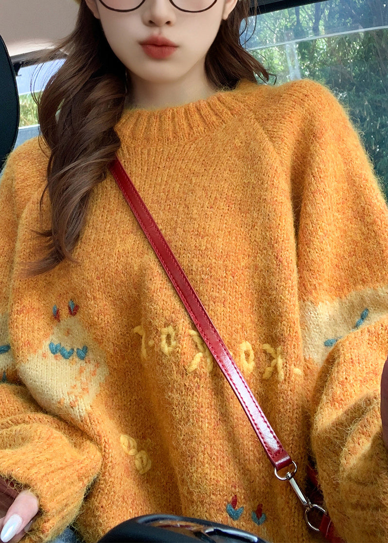 Oranger Strickpullover mit Rundhalsausschnitt, Frühlingsmotiv