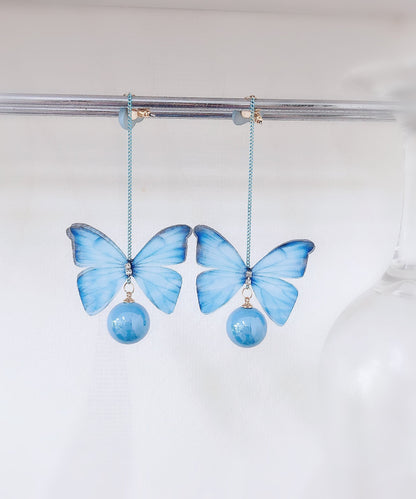 Pendientes colgantes con forma de mariposa y circonita con gemas incrustadas en rosa