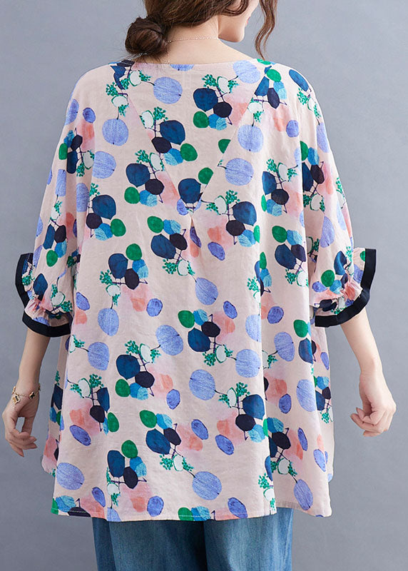 Stil: Rosafarbenes Oberteil mit Rundhalsausschnitt, asymmetrischem Design und Rüschen