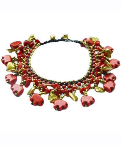 Pulsera con dijes de cera turquesa tejida a mano de cobre arcoíris