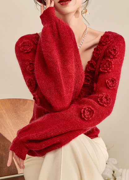 Suéter de punto de algodón liso con cuello en V y cordón ajustable, color rojo y mangas farol.