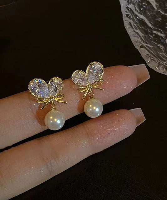 Pendientes colgantes con borlas y lazo de amor de perla y circonita de aleación de cobre blanco