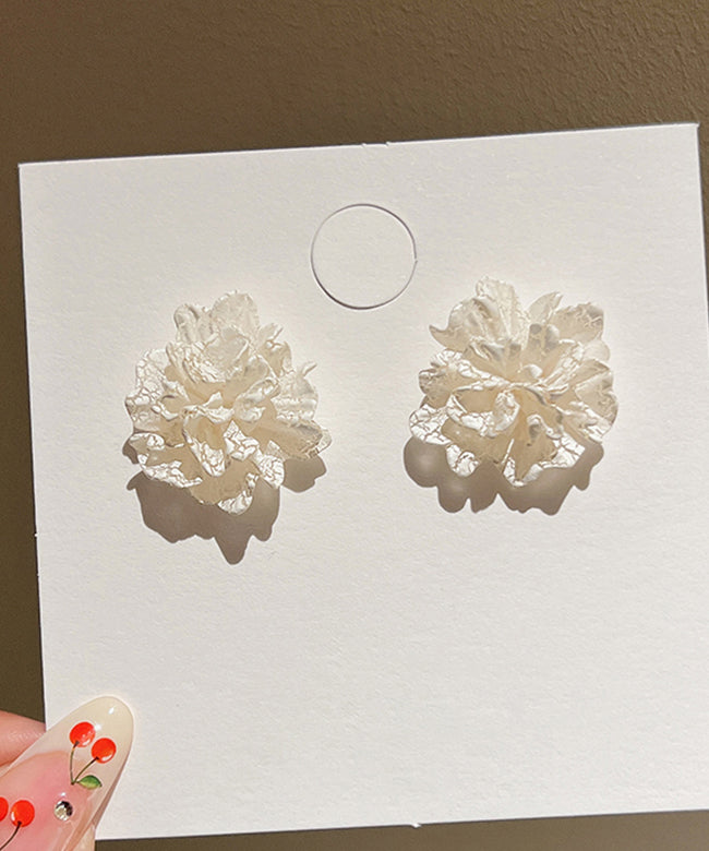 Stil: Weiße Ohrstecker aus Sterlingsilber mit Blumenmuster aus Acryl