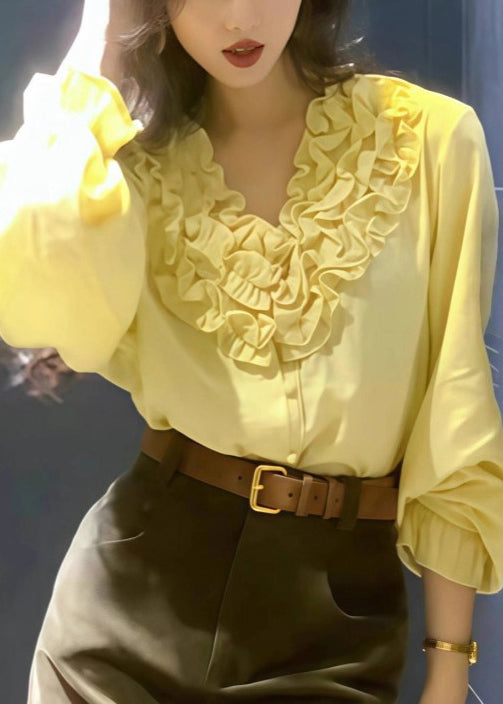 Stilvolle gelbe Rüschenbluse aus Baumwolle im Oversize-Look für den Frühling