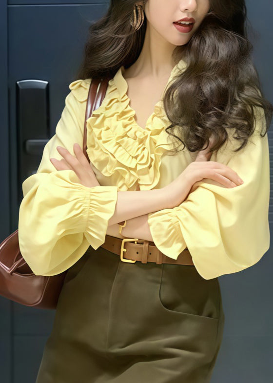Stilvolle gelbe Rüschenbluse aus Baumwolle im Oversize-Look für den Frühling