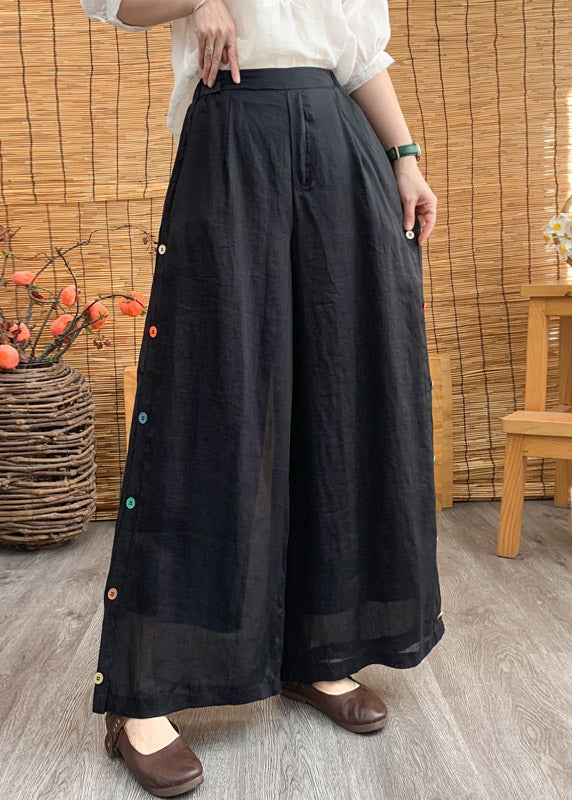 Pantalones anchos de lino liso con cintura elástica y botones negros elegantes para verano