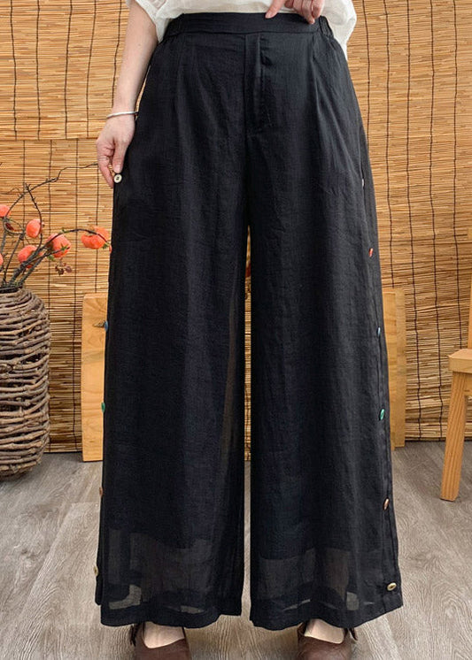 Pantalones anchos de lino liso con cintura elástica y botones negros elegantes para verano