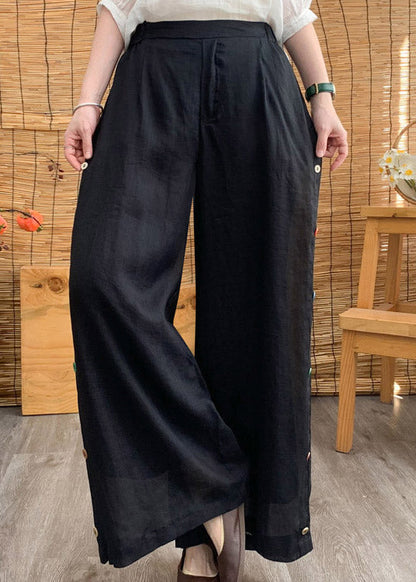 Pantalones anchos de lino liso con cintura elástica y botones negros elegantes para verano