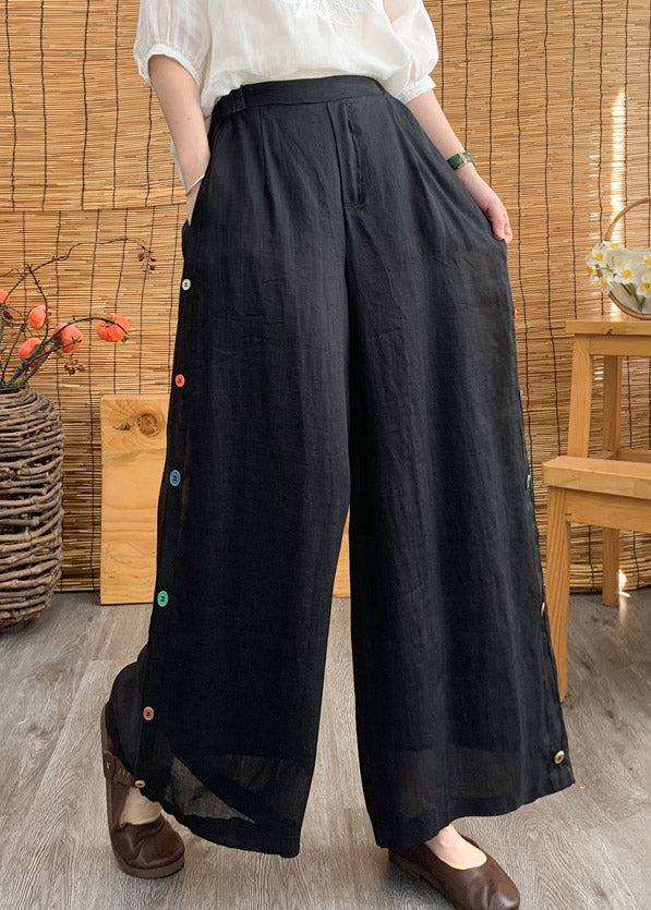 Pantalones anchos de lino liso con cintura elástica y botones negros elegantes para verano
