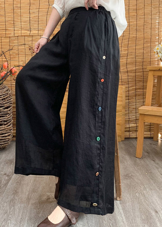 Pantalones anchos de lino liso con cintura elástica y botones negros elegantes para verano