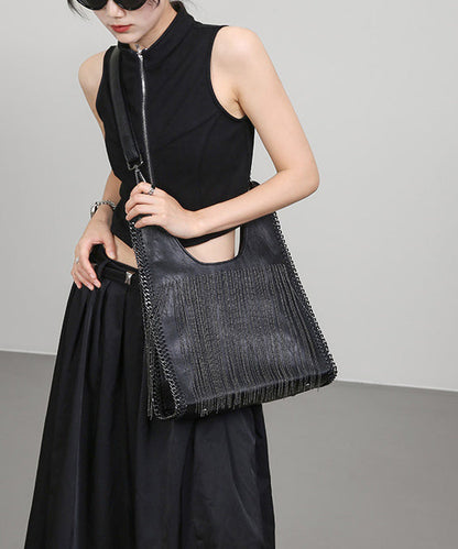 Elegante bolso de hombro de piel sintética con borlas negras y gran capacidad