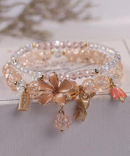 Elegante pulsera de aleación azul con cristales de circonita y dije floral