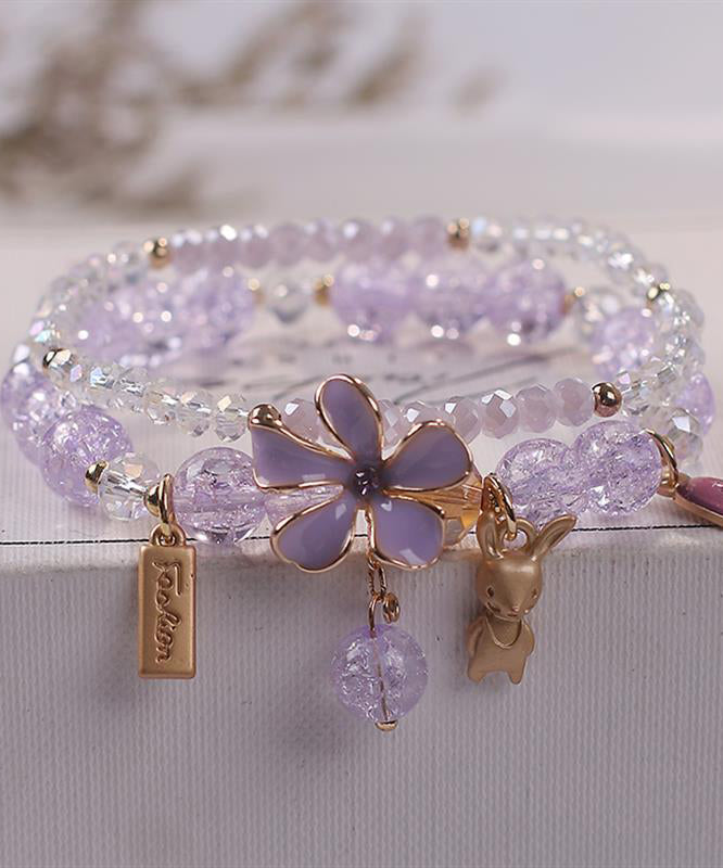 Elegante pulsera de aleación azul con cristales de circonita y dije floral