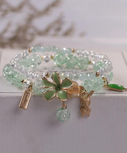 Elegante pulsera de aleación azul con cristales de circonita y dije floral