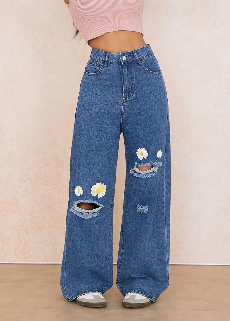 Vaqueros rectos rotos con bolsillos florales bordados en azul elegante para primavera