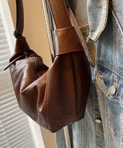 Bolsos de mano elegantes y versátiles de piel sintética marrón sólida y duradera para mujer