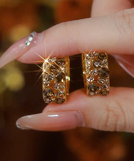 Elegantes pendientes de aro de plata de ley con circonitas doradas en color café