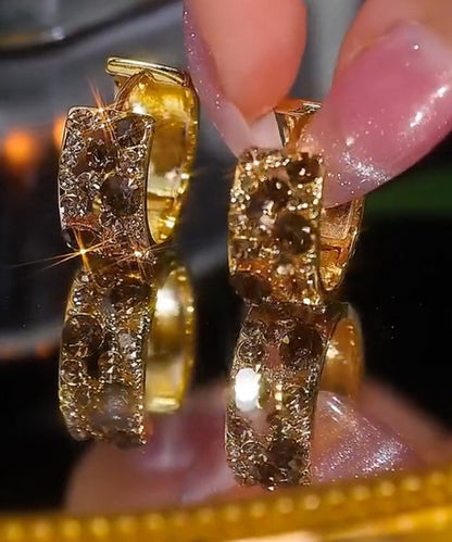 Elegantes pendientes de aro de plata de ley con circonitas doradas en color café