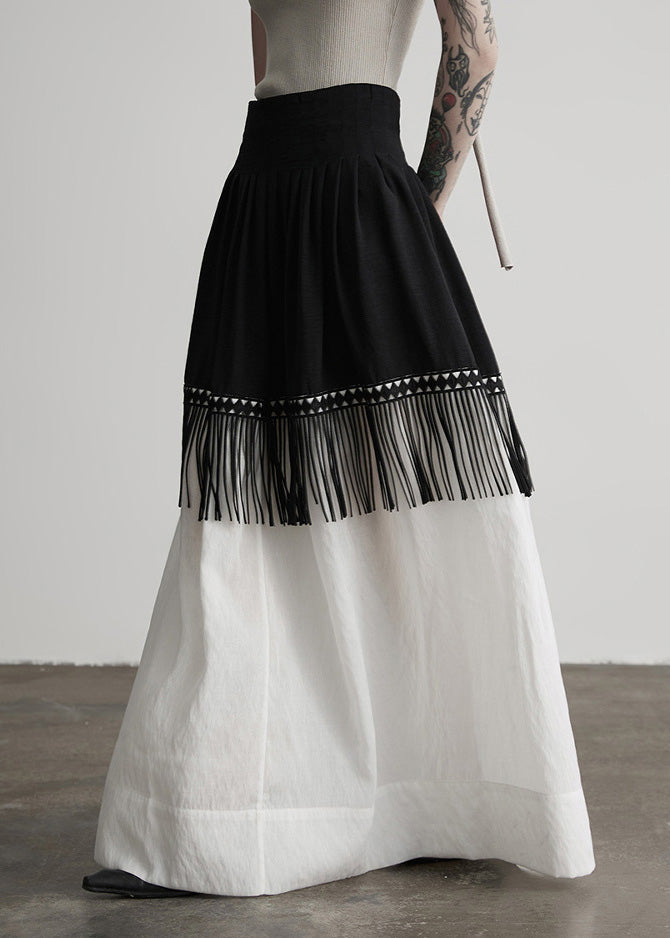 Stilvoller, farblich abgesetzter Patchwork-Baumwollrock mit Quasten für den Frühling