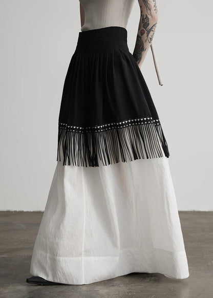 Stilvoller, farblich abgesetzter Patchwork-Baumwollrock mit Quasten für den Frühling