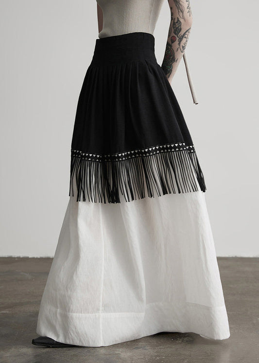 Stilvoller, farblich abgesetzter Patchwork-Baumwollrock mit Quasten für den Frühling