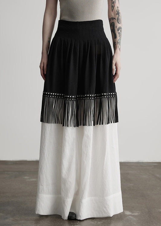 Stilvoller, farblich abgesetzter Patchwork-Baumwollrock mit Quasten für den Frühling