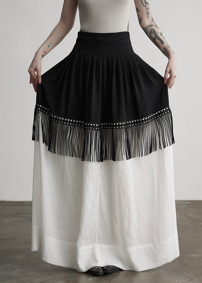 Stilvoller, farblich abgesetzter Patchwork-Baumwollrock mit Quasten für den Frühling