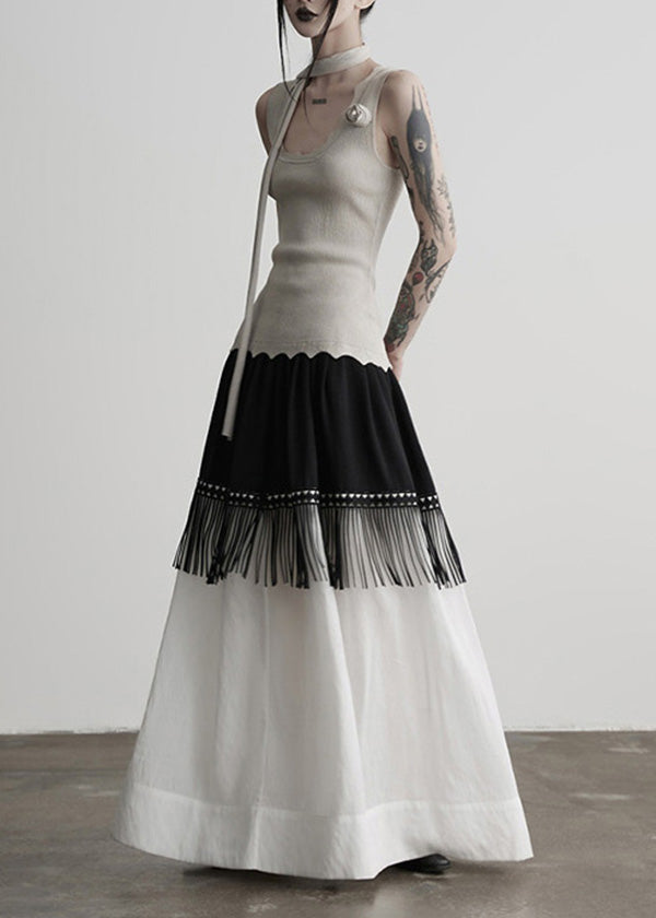 Stilvoller, farblich abgesetzter Patchwork-Baumwollrock mit Quasten für den Frühling