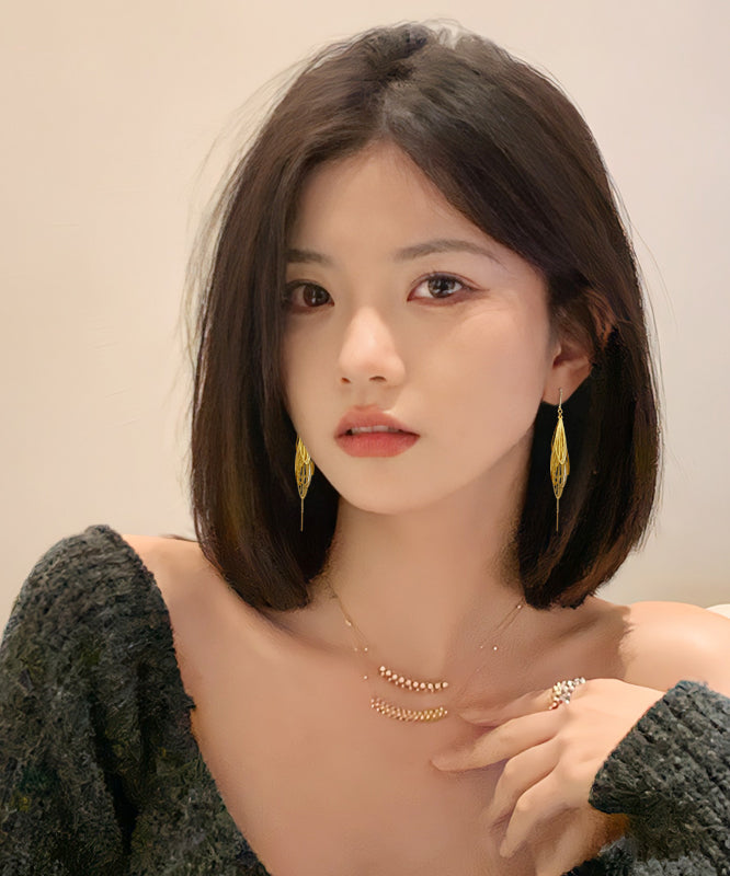 Elegantes pendientes colgantes con borlas huecas de aleación de oro