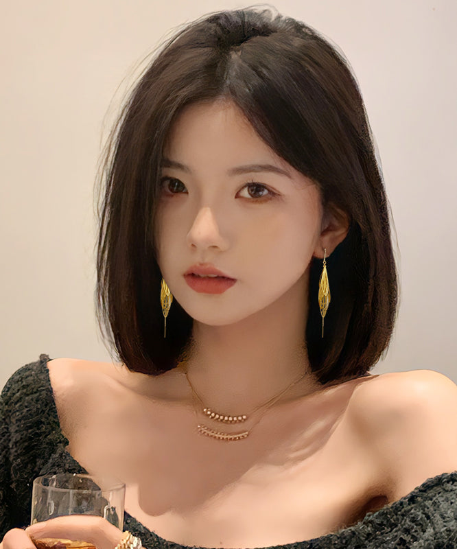 Elegantes pendientes colgantes con borlas huecas de aleación de oro