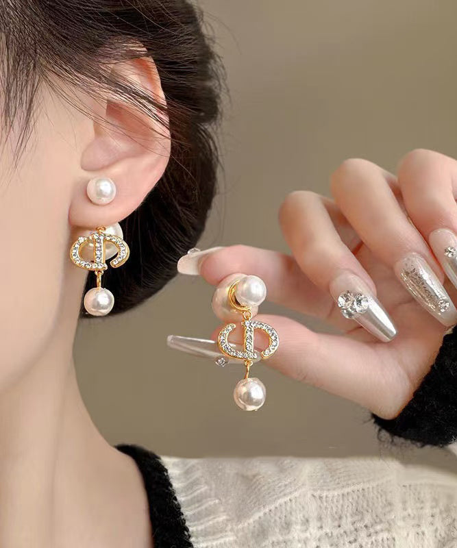 Elegante Ohrhänger aus Gold-Kupfer-Legierung mit Zirkonia und Perlen