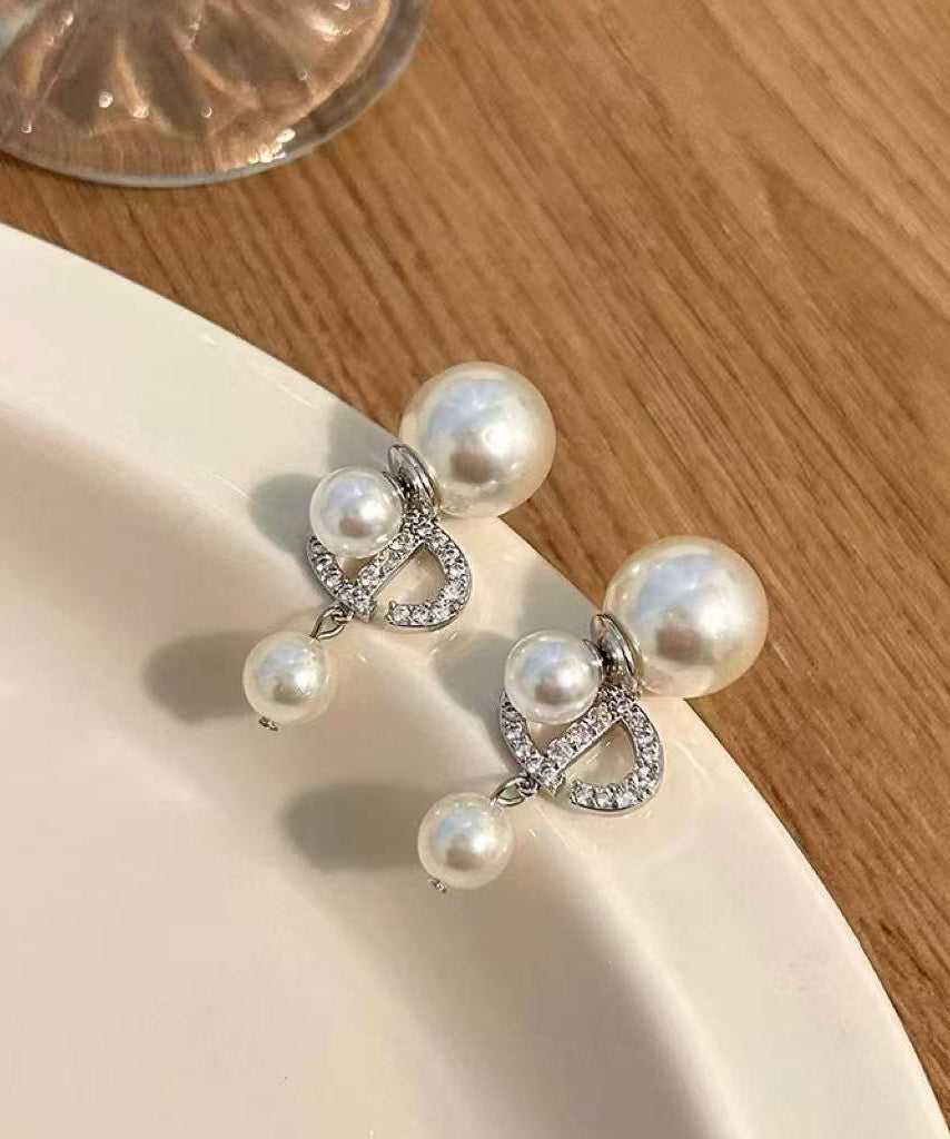 Elegante Ohrhänger aus Gold-Kupfer-Legierung mit Zirkonia und Perlen