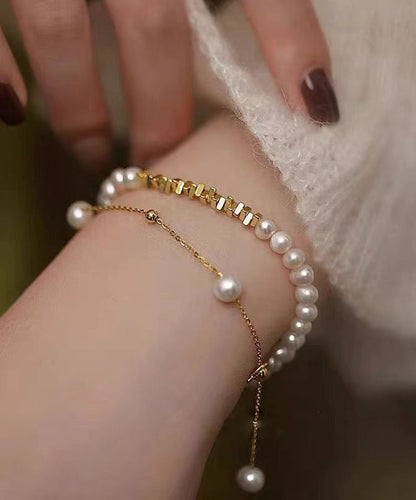 Stilvolles zweiteiliges Charm-Armband-Set aus vergoldeten Kupferperlen mit zerkleinerter Silberquaste