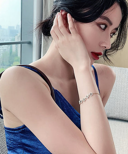 Stilvolles Gold-Kupfer-Overgild Zirkon Blumen Charm Armband