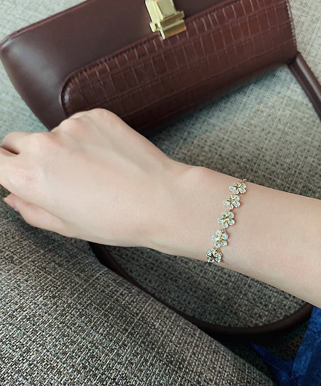 Stilvolles Gold-Kupfer-Overgild Zirkon Blumen Charm Armband