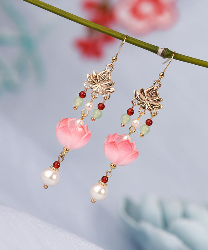 Elegantes pendientes colgantes con borlas de loto y esmalte de jade coloreado y dorado