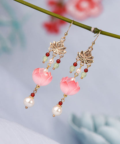Elegantes pendientes colgantes con borlas de loto y esmalte de jade coloreado y dorado