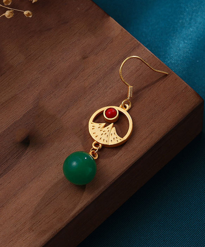 Stilvolle Creolen mit eingelegter grüner Achatperle und Asymmetrie