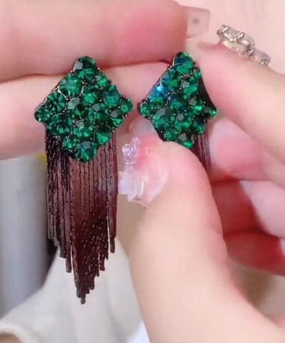 Elegantes pendientes colgantes con borlas de circonitas y diamantes dorados en plata de ley verde