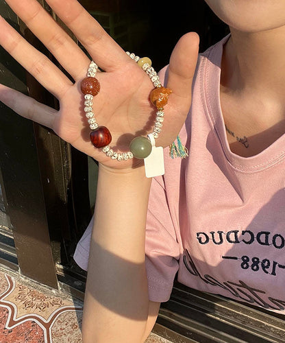 Elegante pulsera con borlas Bodhi, estrella y luna tejida a mano