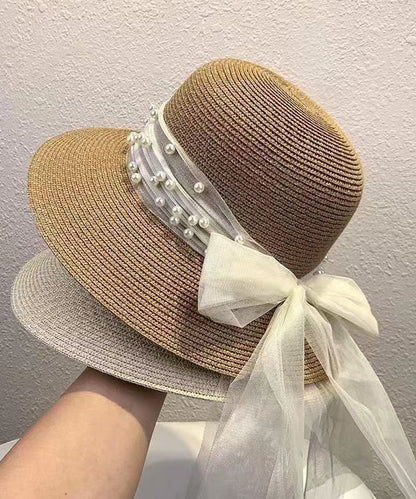 Sombrero para el sol flexible tejido de paja con cuentas y lazo color caqui con estilo