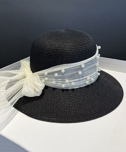 Sombrero para el sol flexible tejido de paja con cuentas y lazo color caqui con estilo