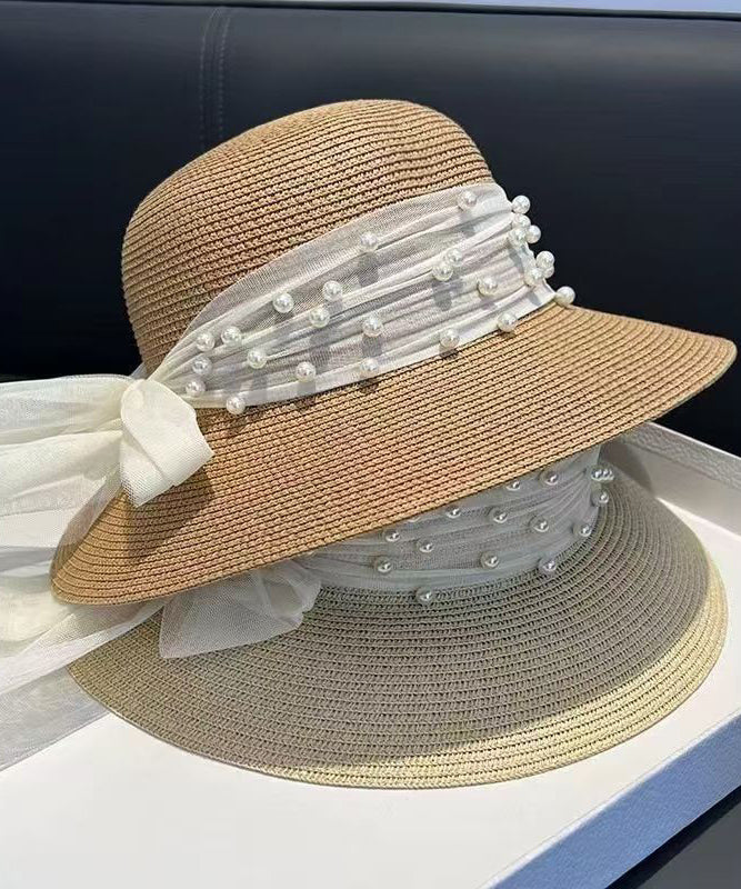 Sombrero para el sol flexible tejido de paja con cuentas y lazo color caqui con estilo