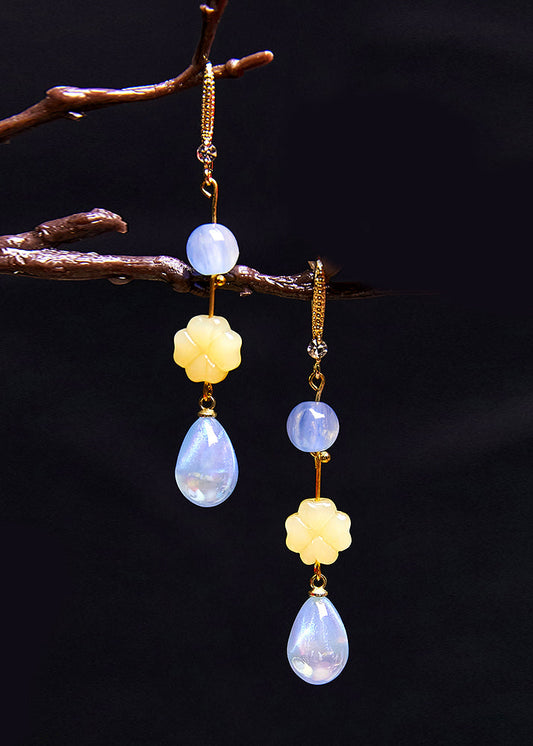 Elegantes pendientes de acrílico con gotas de agua azul lago