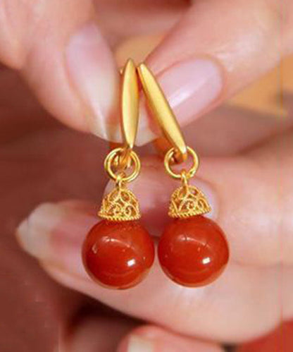 Elegantes pendientes colgantes de turquesa dorada en plata de ley verde claro